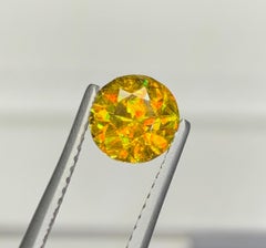 Pierre précieuse Nature Sphène Titanite : Taille ronde multicolore lustrée, 1,46 carat