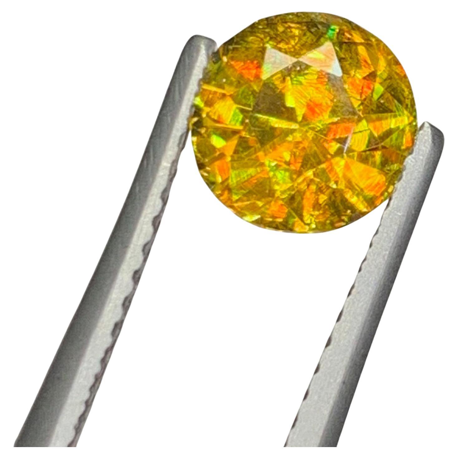 Natural Sphene Titanite Gemstone: Lustrous Multi Color Round Cut, 1.46 Carat For Sale