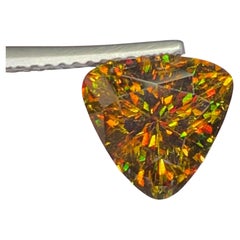 Natural Sphene Titanite Gemstone: Lustrous Multi Color Trillion Cut, 3.39 Carat