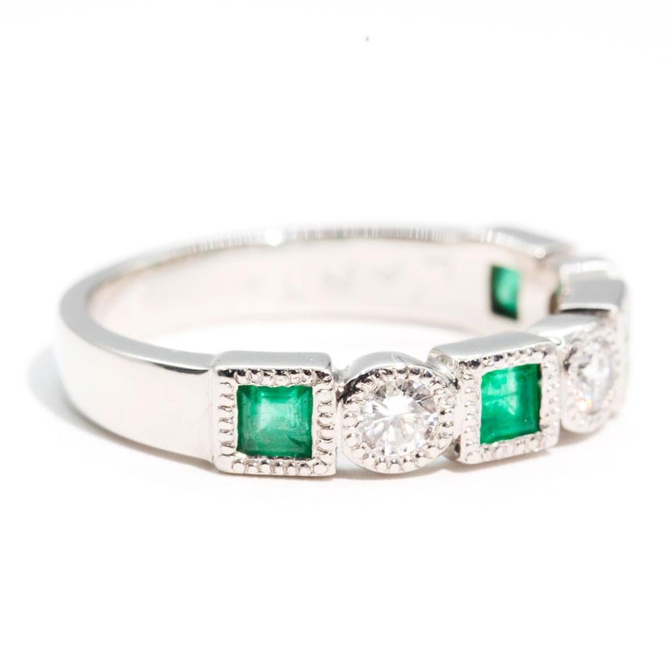Forged platinum is this darling vintage ring featuring a charming row of sparkling round white diamonds and gorgeous square cut green emeralds. We have named this vintage splendour The Antonella Ring. The Antonella Ring is perfect on her own, or she