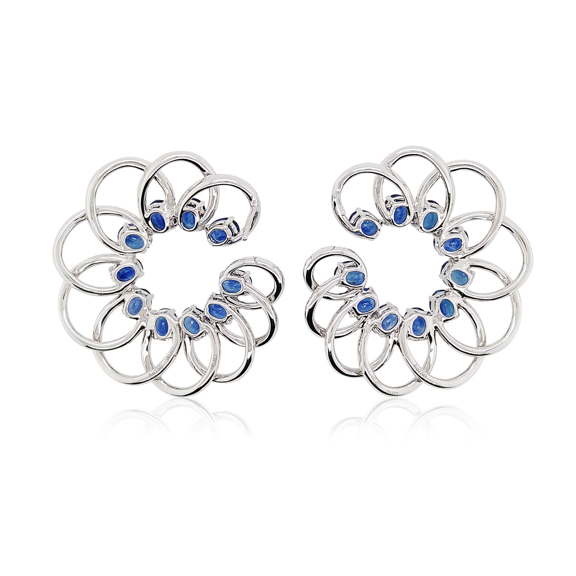 These contemporary earrings combine vibrant Sri Lankan Sapphires with the vivid tones of rich Blue and sparkling White Diamonds. Putting style at the forefront of their design, these unique earrings offer a contemporary way to wear Sapphires –