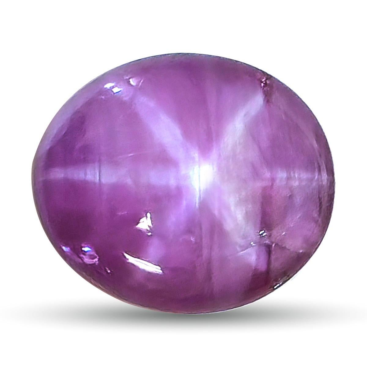 Discover the enchanting beauty of this natural star purple sapphire, weighing 6.40 carats. This remarkable gemstone showcases a stunning star effect, making it a truly unique piece for any fine jewelry collection.

Carat Weight: 6.40 carats,