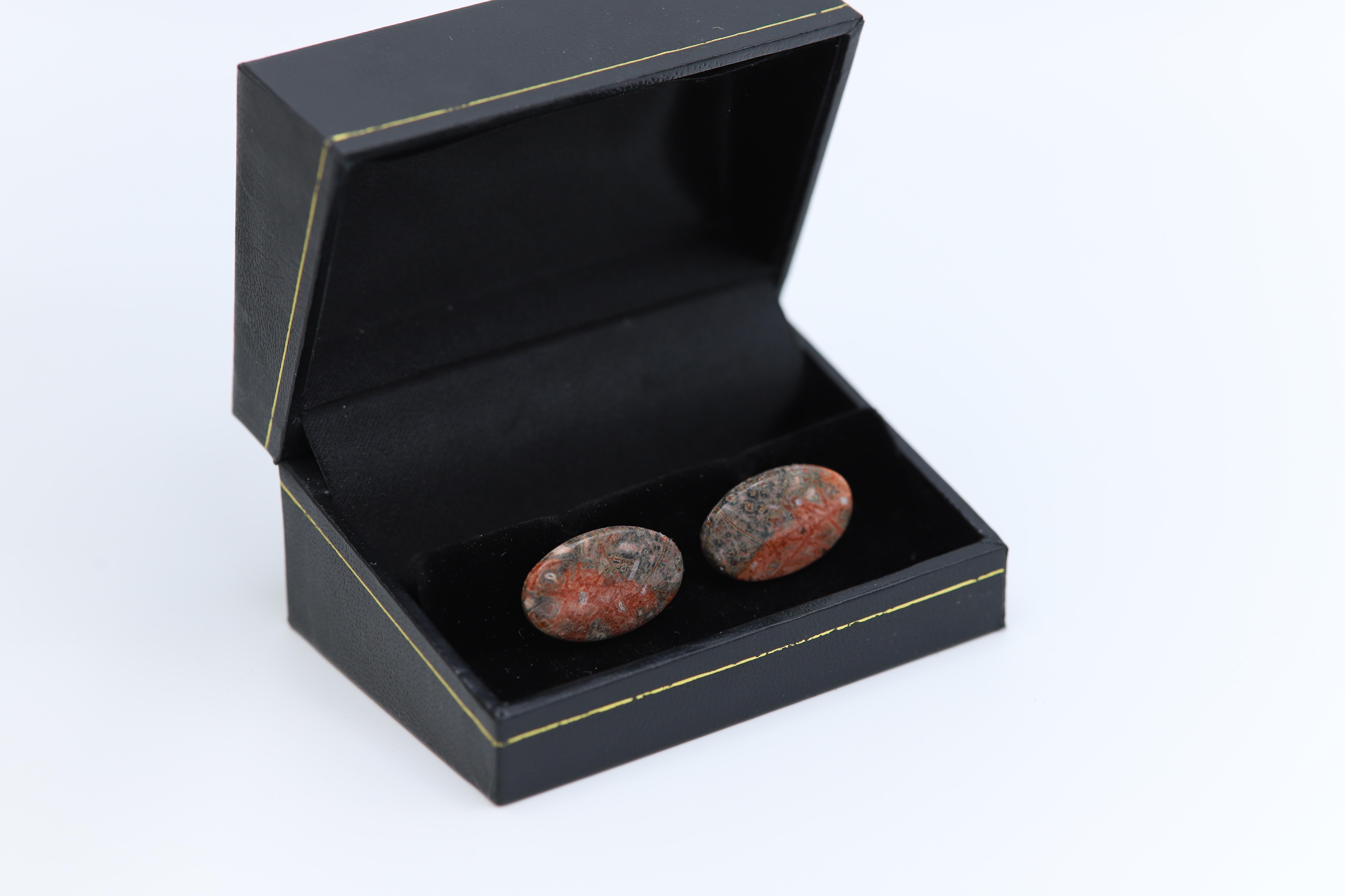 New unique men's cufflink - natural stone.
Stone name: Leopard skin Jasper
Approx. size 20 X 10 MM
Beautiful natural texture.
Imperfection may exist due to natural formations.
Back part metal is a general alloy metal - none precious
Gift Box