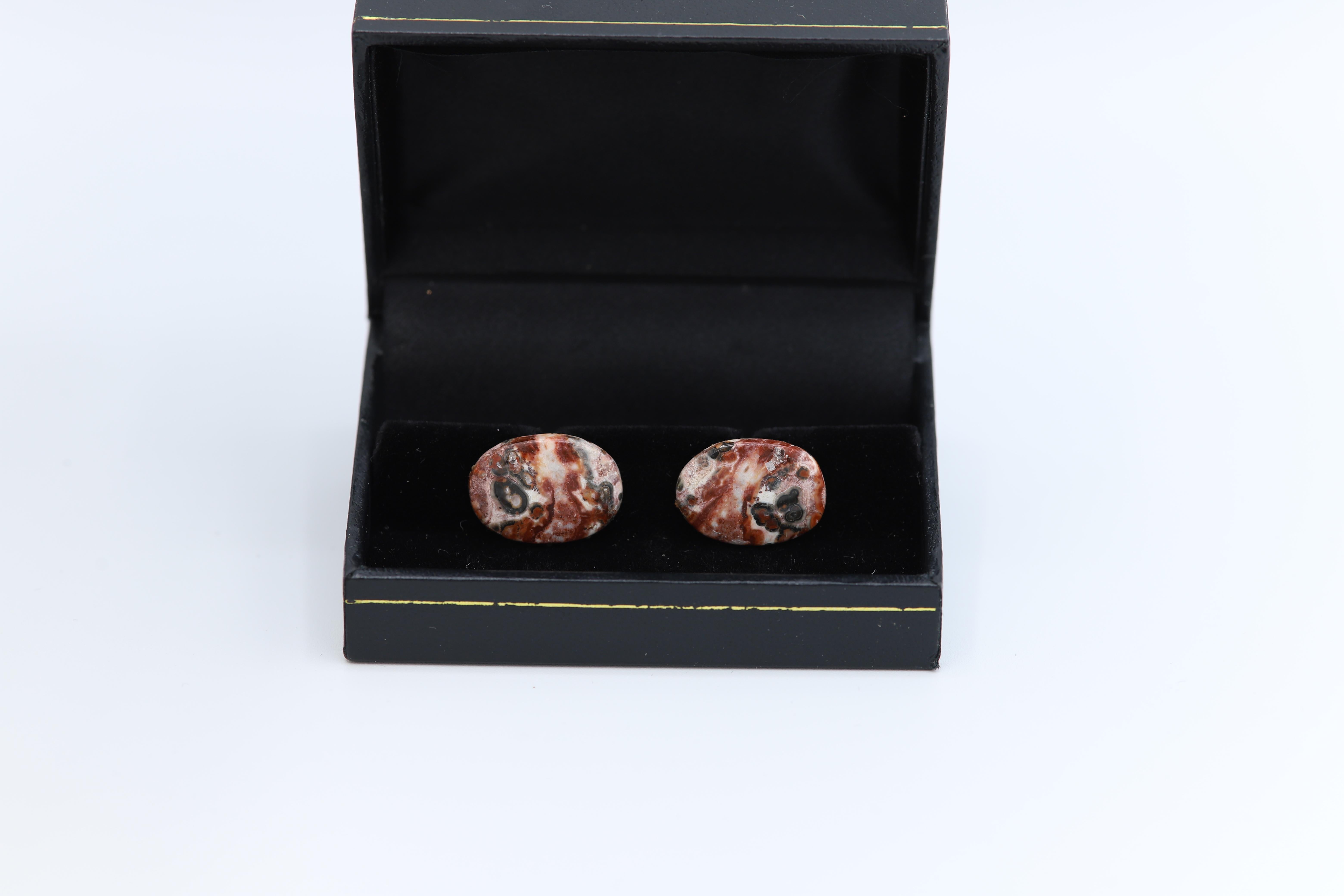 New unique men's cufflink - natural stone.
Stone name: Leopard skin Jasper
Approx. size 19 X 14 MM
Beautiful natural texture.
Imperfection may exist due to natural formations.
Back part metal is a general alloy metal - none precious
Gift Box