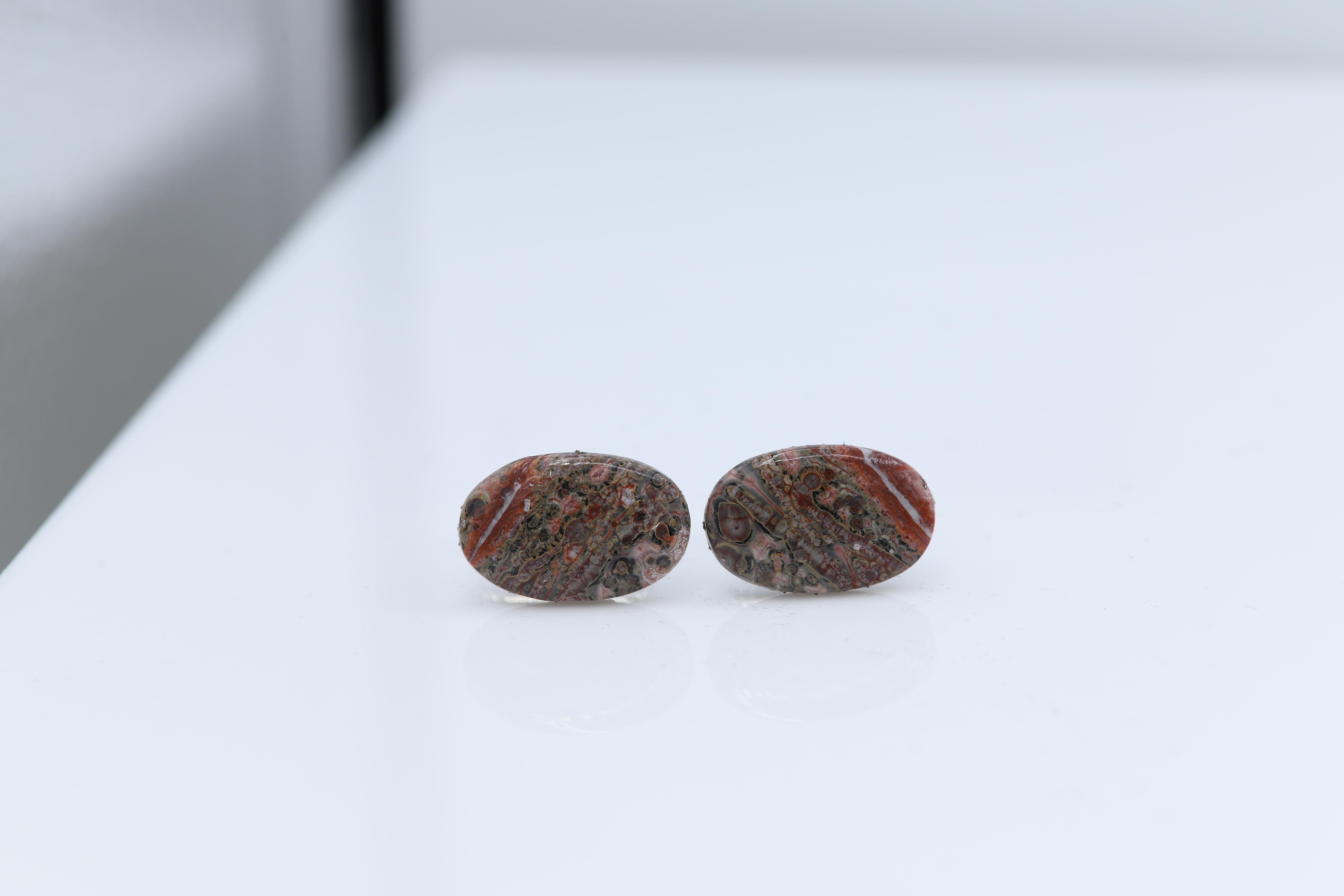 New unique men's cufflink - natural stone.
Stone name: Leopard skin Jasper
Approx. size 22 X 14 MM
Beautiful natural texture.
Imperfection may exist due to natural formations.
Back part metal is a general alloy metal - none precious
Gift Box