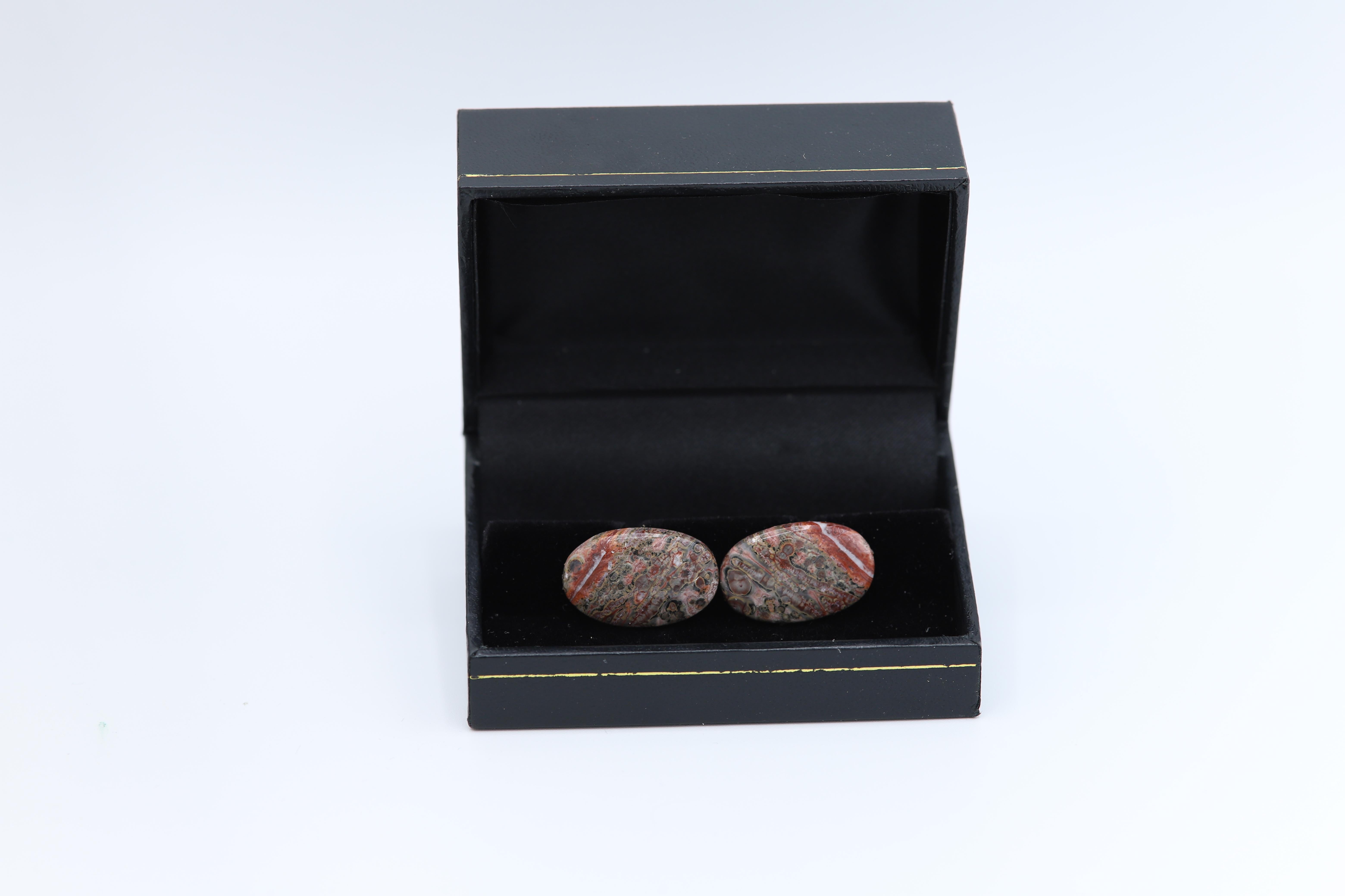 New unique men's cufflink - natural stone.
Stone name: Leopard skin Jasper
Approx. size 22 X 14 MM
Beautiful natural texture.
Imperfection may exist due to natural formations.
Back part metal is a general alloy metal - none precious
Gift Box