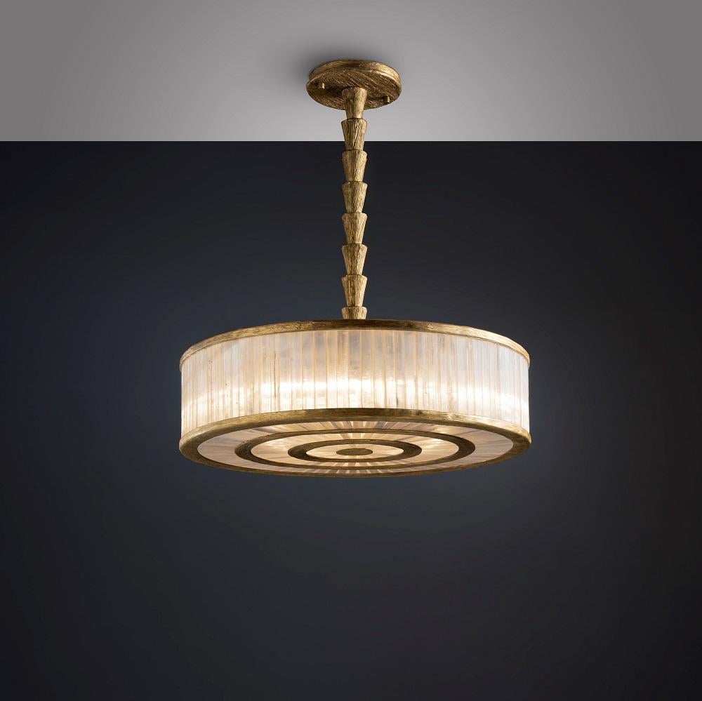 Natural stone pendant lamp I by Aver
Dimensions: D 80 x H 25 cm
Materials: Natural rocks, high-quality cut crystals, jewelry chains, hand-blown glass, other.
Also Available: Matte Black, Rustic Silver, Oxidized Graphite, and Rustic Bronze.

The
