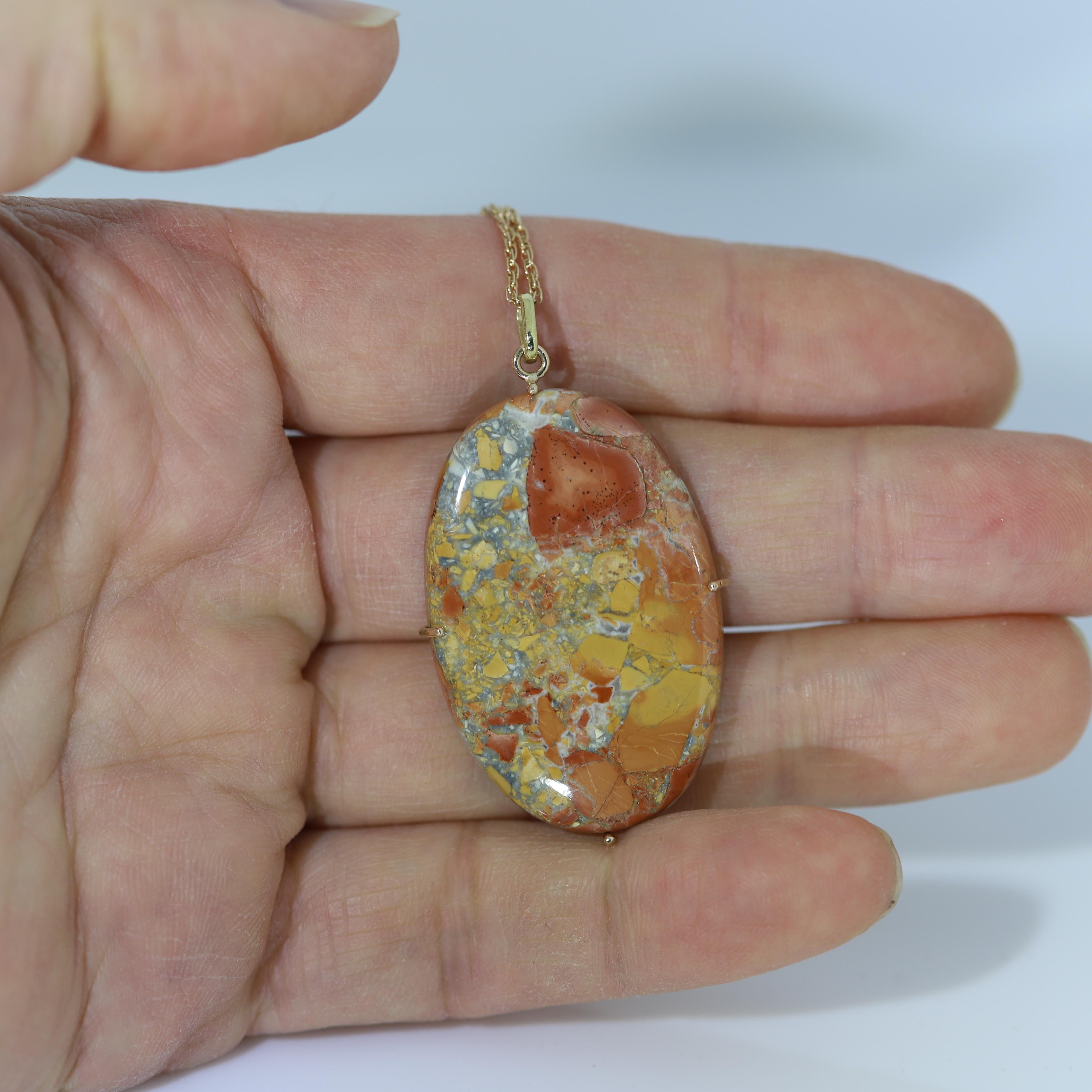 Colorful Maligano Jasper Natural stone Pendant - set in 14k yellow gold wire.
approx size 1.75' inch Tall (45 x 25 mm) 
Chain 18' Inch.
Bright Brown-Yellow tone.
Origin: Indonesia
Made in elegant style that the stone is exposed to the