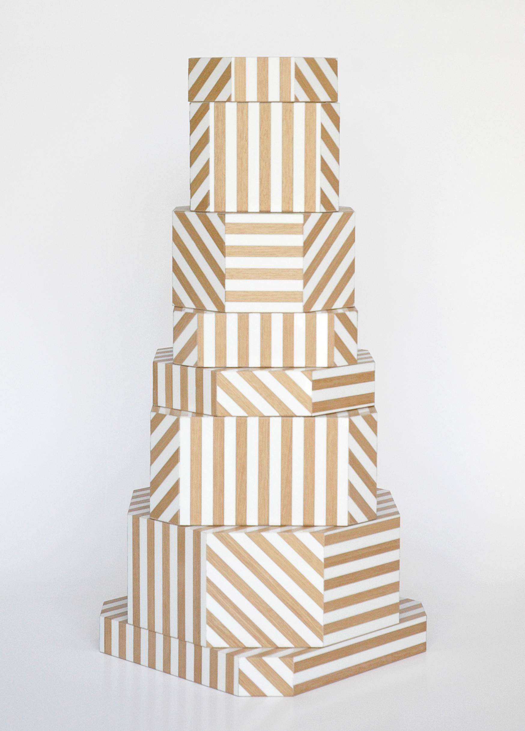 Natural Stripes Ziggurat boxes by Oeuffice
Edition: 12 + 2AP
2012
Dimensions: 25 x 25 x 55 cm
Materials: wood box, acrylic, solid stained wood

The Natural Stripes edition is a softer and more restrained version of its
Black Stripes sibling.