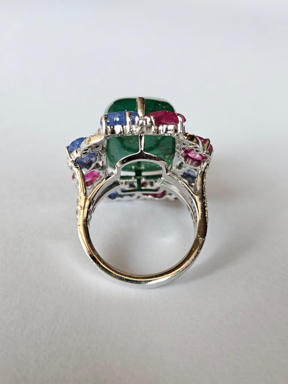 Modern Natural Sugarloaf Emerald, carved Blue Sapphires, Rubies & Diamond Cocktail Ring For Sale
