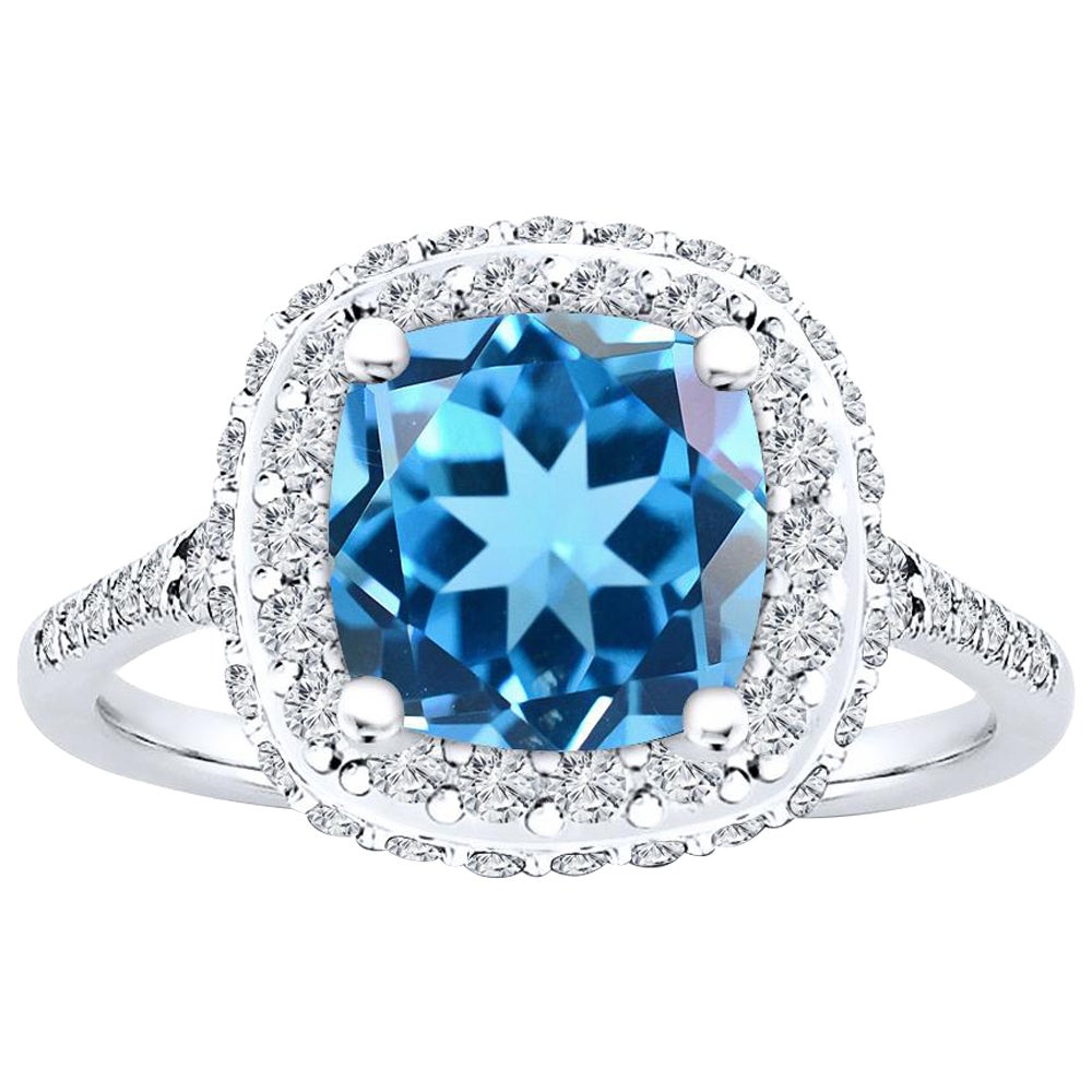 Im Angebot: Natürlicher Schweizer Blautopas im Kissenschliff Halo 0,75 Karat Diamantring ()