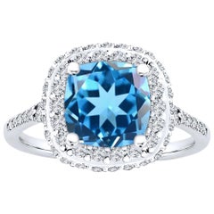 Natürlicher Schweizer Blautopas im Kissenschliff Halo 0,75 Karat Diamantring