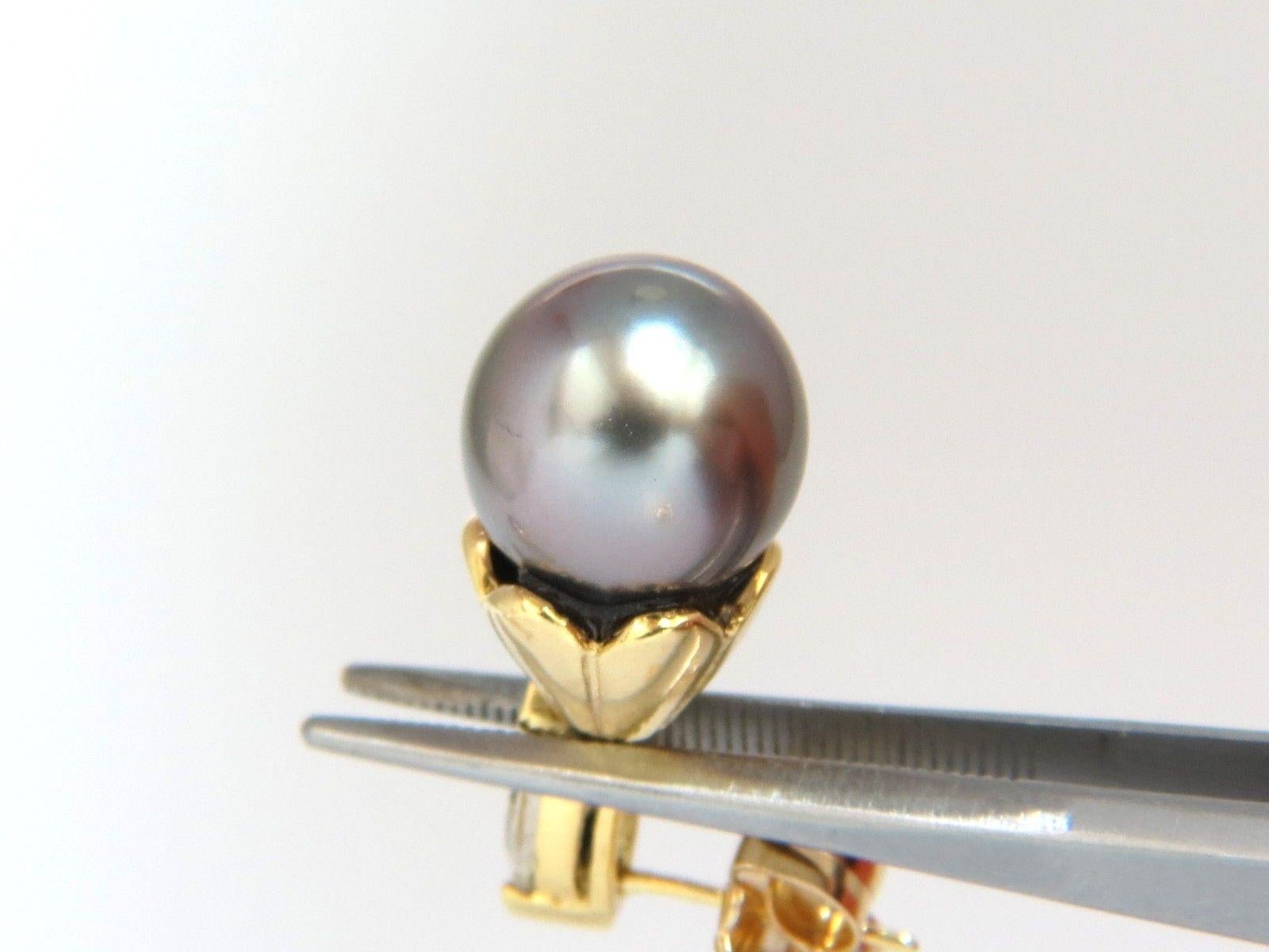 Drop Cap.

10mm natural Tahitian Pearls,

Pintada Mollusk, Black Lipped Oyster

Silvery Grey luster with slight pink overtone 

.40ct. Natural diamonds  

marquise, Full cut brilliants.

J- color Si-1 Clarity. 

Secure Push Backs

Excellent