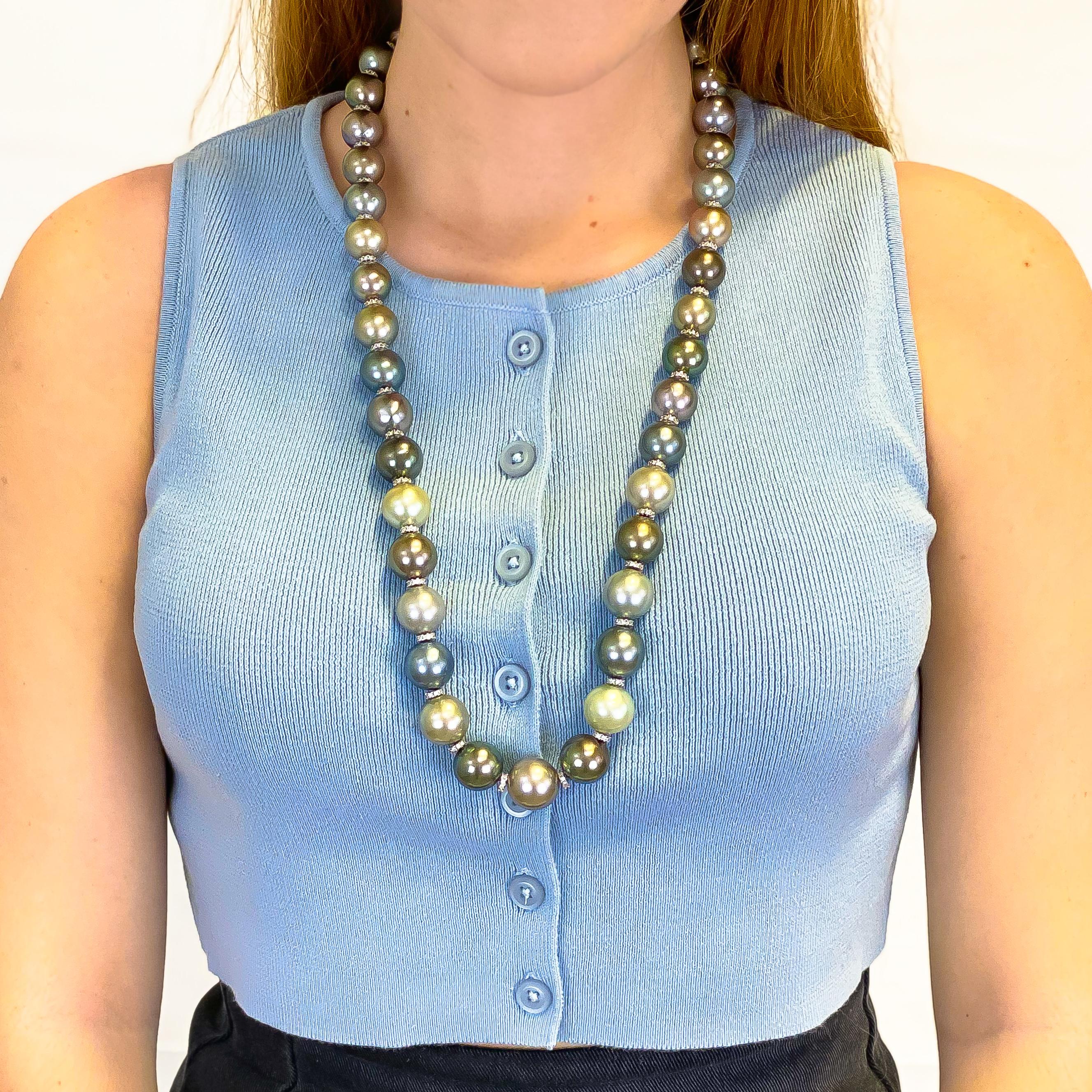 Natural Tahitian Pearls = 13.50 - 17.50 millimeters

Length = 27 Inches

Jewelry Gift Box Included