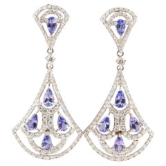 Natural tanzanaite diamond earring in 14k gold