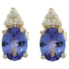 Boucles d'oreilles en or jaune 14 carats avec diamants et Tanzanite naturelle