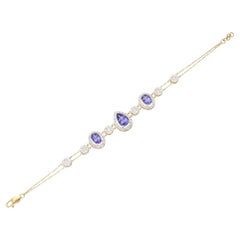 Natural Tanzanite 3.34cts & diamond 1.69cts bracelet in 14k gold