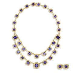 Collana e orecchini in oro giallo 18 carati con tanzanite naturale da 58,71 carati, diamanti da 22,69 carati
