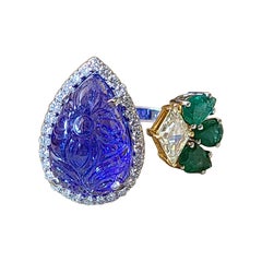 Natural Tanzanite and Emerald Ring Set in 18 Karat Gold with Diamond