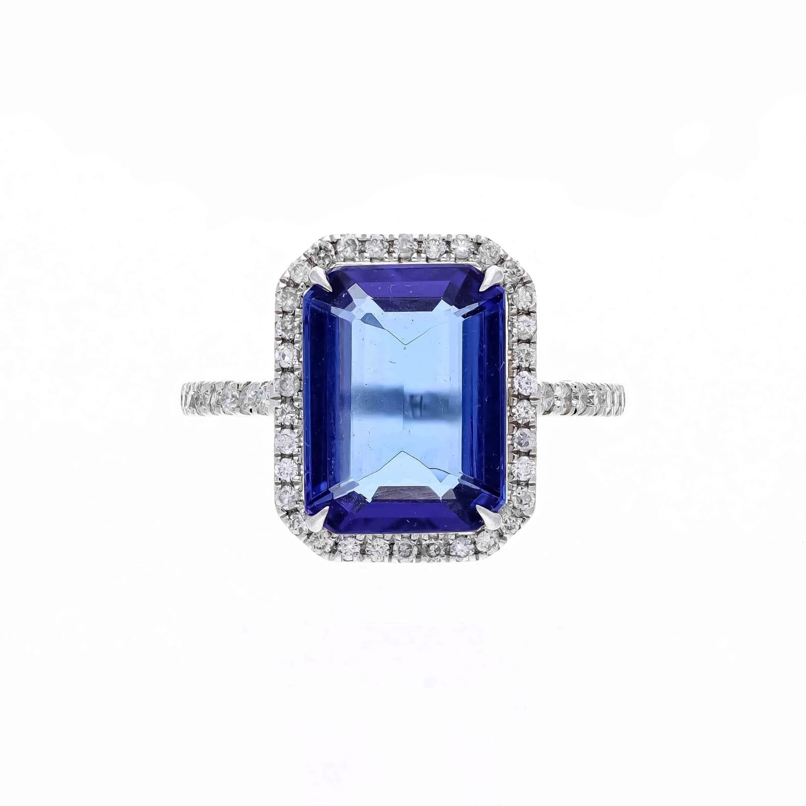 Superb tanzanite stone with best color and clarity ring perfect for your outing.

diamonds ;
0.69 carats 
Tanzanite  ( 5.56 carats)
gold ( 2.80 gms)



It’s very hard to capture the true color and luster of the stone, I have tried to add pictures