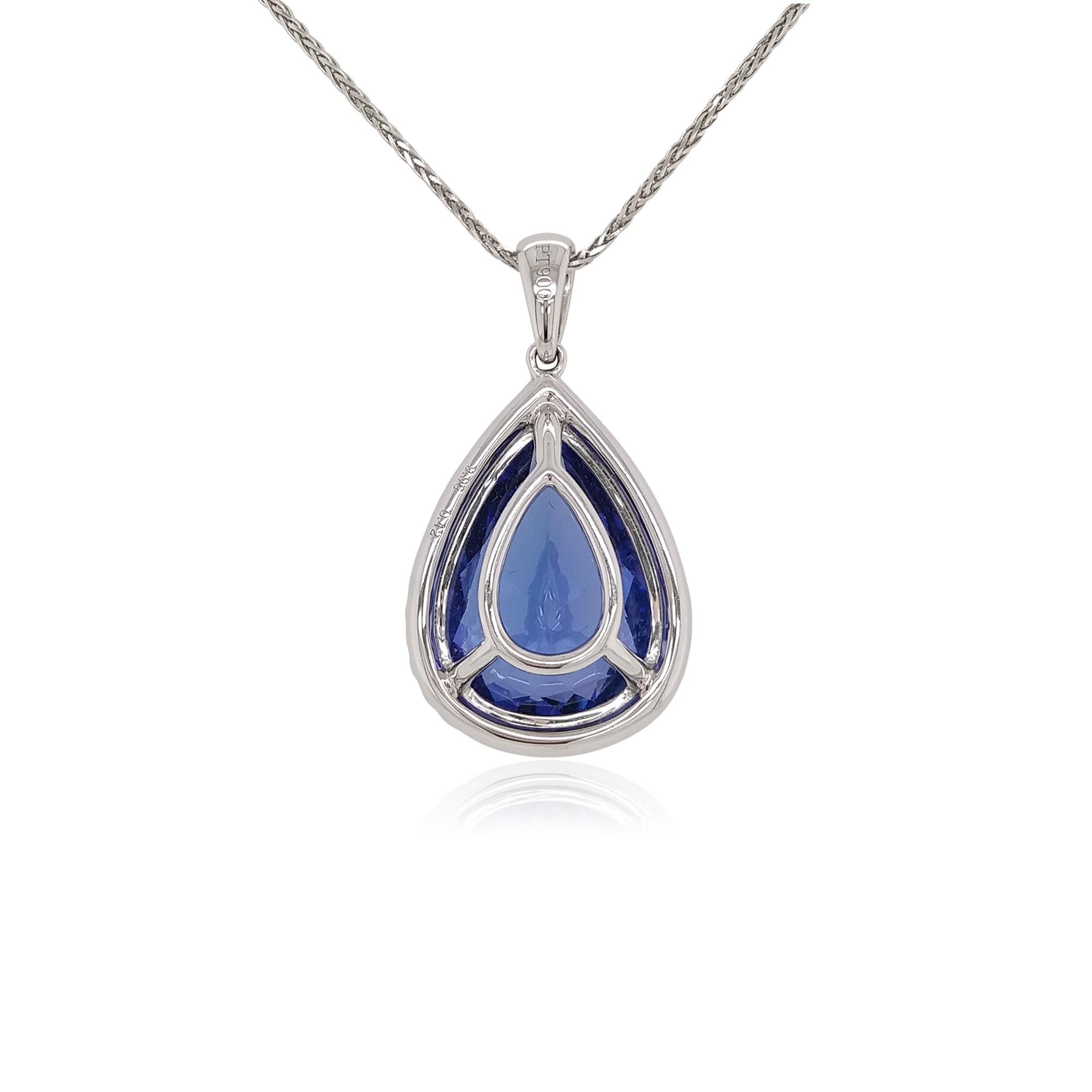 This unique platinum pendant design features a lustrous natural Tanzanite set amongst a contemporary design of White Diamonds. Set in Platinum to enrich the sparkle of the diamonds and the lustre of the Tanzanite, this elegant pendant is perfect for
