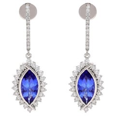 Orecchino con tanzanite naturale e diamante in oro 18 carati