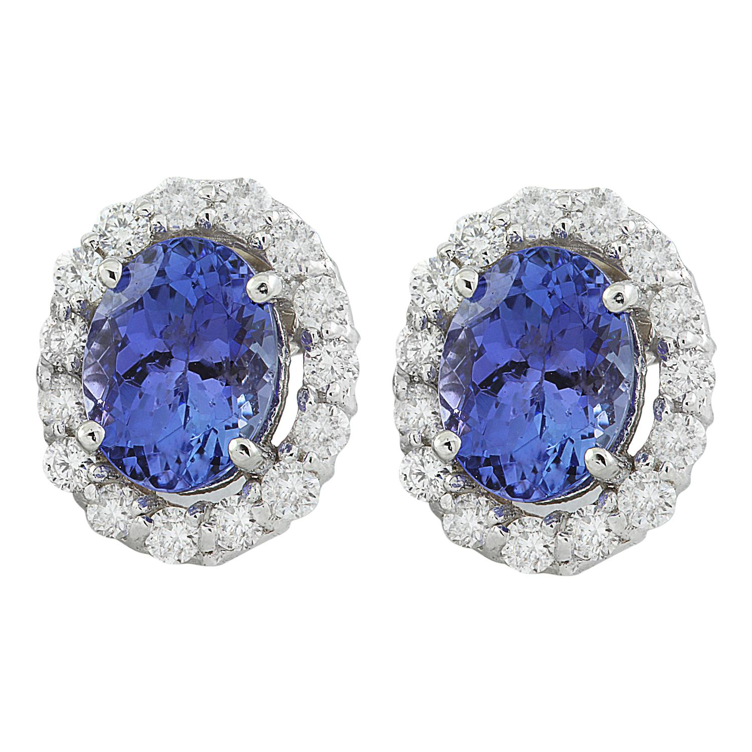 3.07 Carat Natural Tanzanite 14 Karat Solid White Gold Diamond Earrings 
Stamped: 14K 
Total Earrings Weight: 2.1 Grams 
Tanzanite Weight: 2.37 Carat (8.00x6.00 Millimeters)
Diamond Weight: 0.70 Carat (F-G Color, VS2-SI1 Clarity)
Face Measures:
