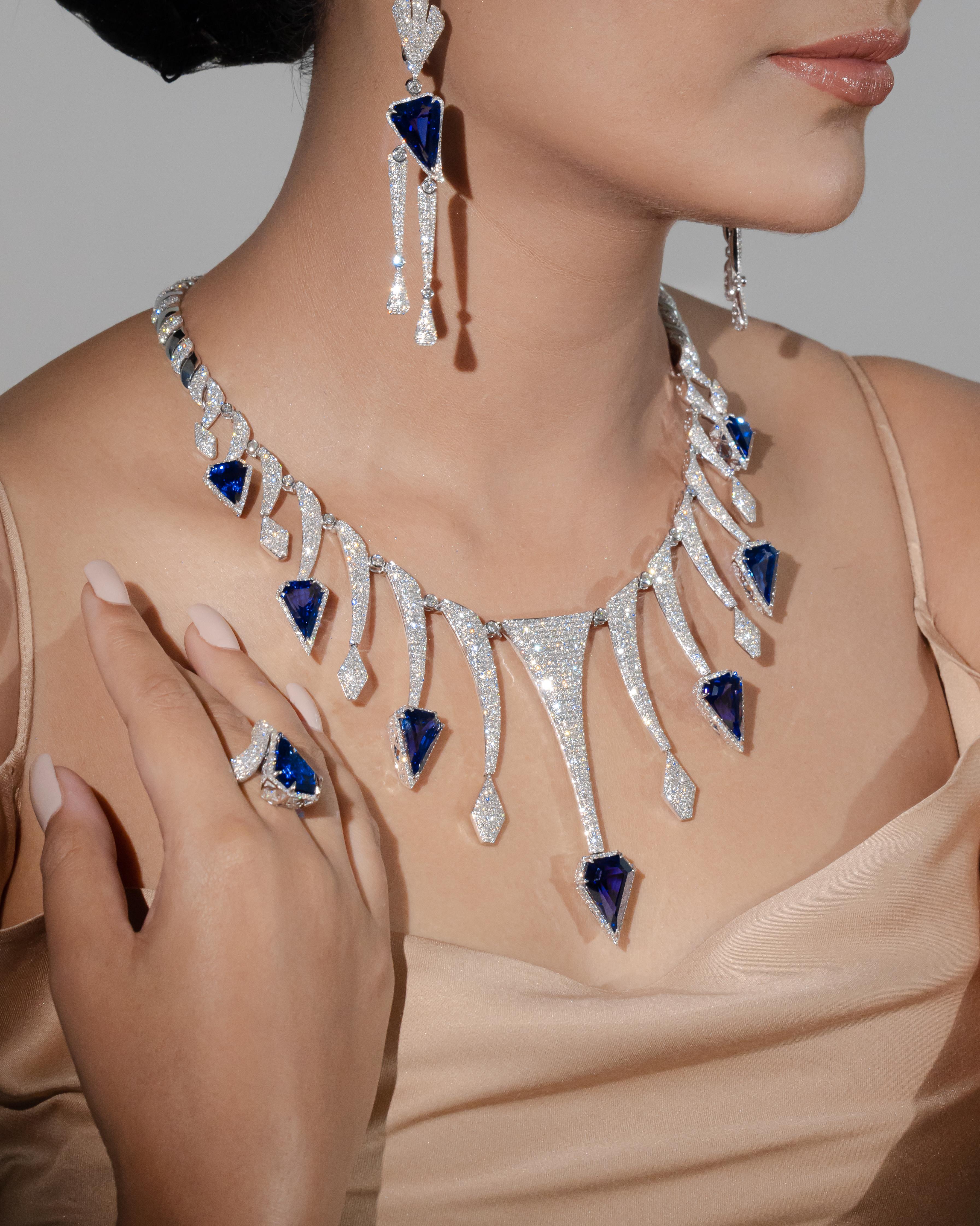 Natural Tanzanite, Diamond Necklace and Matching Ring, Earring in 18k White Gold


Necklace Details: - 
 Primary Stone: - Tanzanite
 Primary Stone Shape: - Fancy Shape
 Primary Stone Cut: - Faceted
 Primary Stone Weight: - 61.5 CT's

Necklace