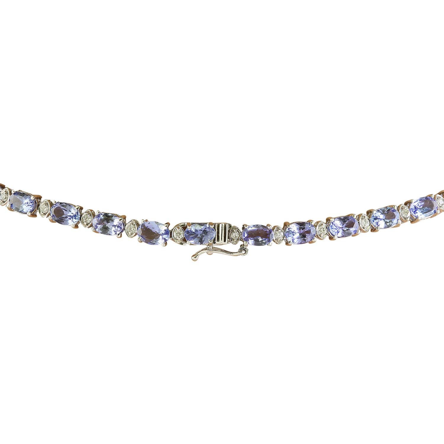 38.20 Carat Natural Tanzanite 14 Karat Solid White Gold Diamond Necklace
Stamped: 14K
Total Necklace Weight: 18 Grams
Necklace Length 18 Inches
Center Tanzanite Weight: 1.60 Carat (8.00x6.00 Millimeters)
 Side Tanzanite Weight: 34.40 Carat
