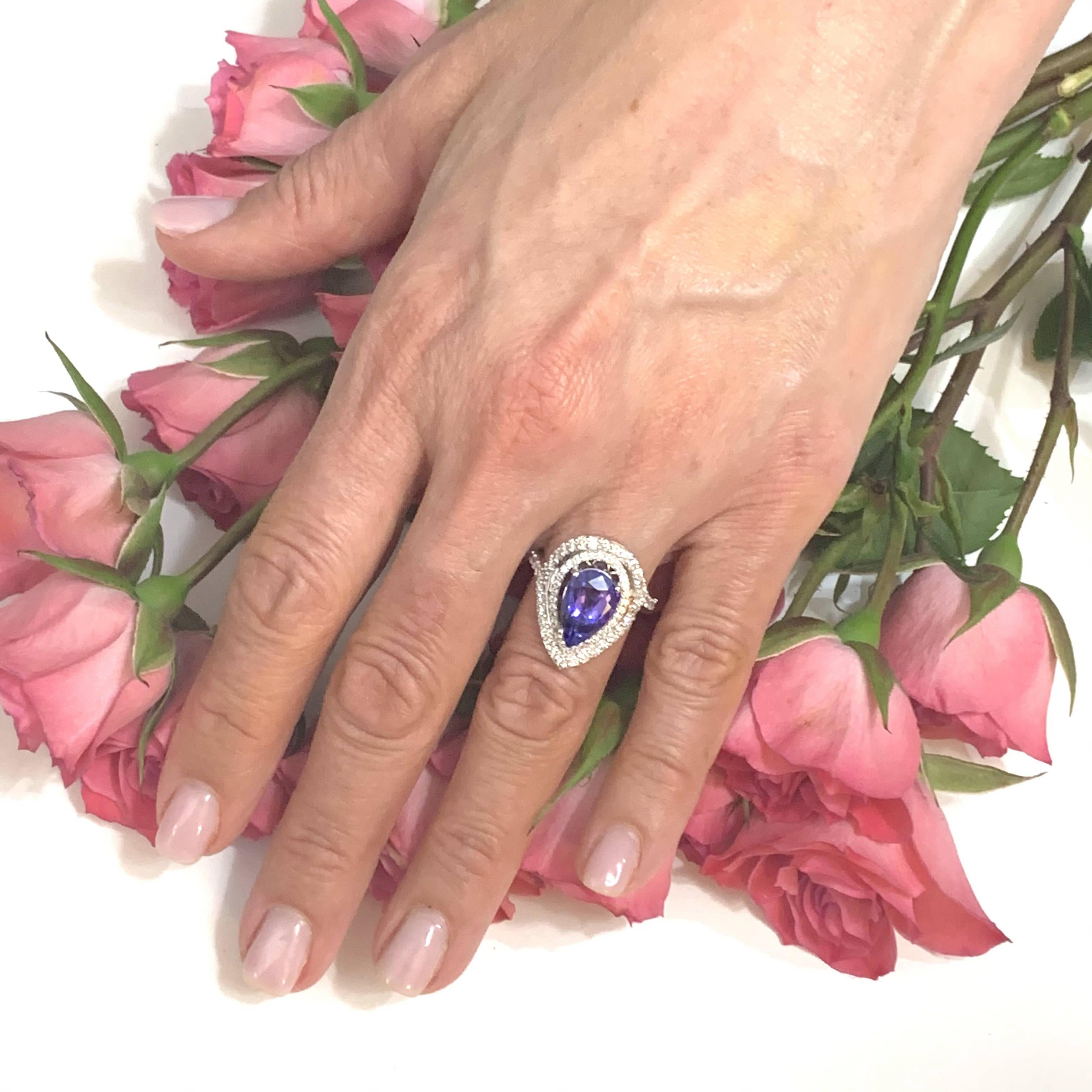 Natural Finely Faceted Quality Tanzanite and Diamond Ring set in 14k Gold 4.54 TCW Size 5.75 resizable 

GIA Certified $5,950 111877

This is a Unique Custom Made Glamorous Piece of Jewelry!

This exquisite ring features a finely faceted, natural