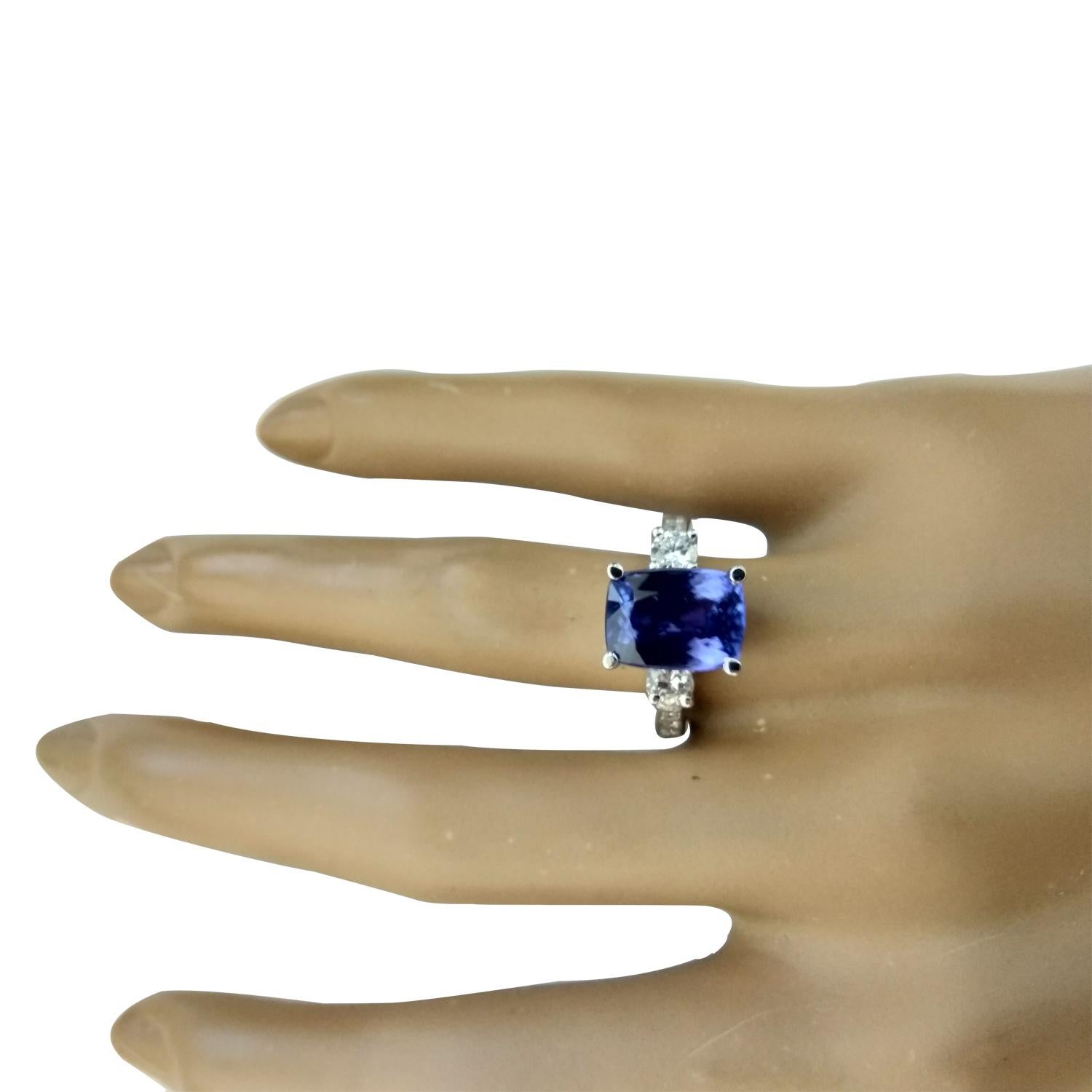 5.40 Carat Natural Tanzanite 14 Karat Solid White Gold Diamond Ring
Stamped: 14K 
Total Ring Weight: 4.8 Grams
Tanzanite Weight 4.40 Carat (10.00x8.00 Millimeters)
Diamond Weight: 1.00 carat (F-G Color, VS2-SI1 Clarity)
Quantity: 10
Face Measures: