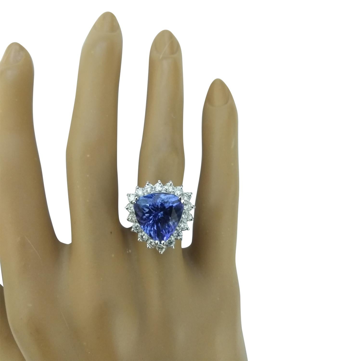 8.12 Carat Natural Tanzanite 14 Karat Solid White Gold Diamond Ring
Stamped: 14K 
Total Ring Weight: 5.1 Grams 
Tanzanite Weight 7.22 Carat (12.30x12.30 Millimeters)
Diamond Weight: 0.90 carat (F-G Color, VS2-SI1 Clarity )
Face Measures: 18.05x18.30