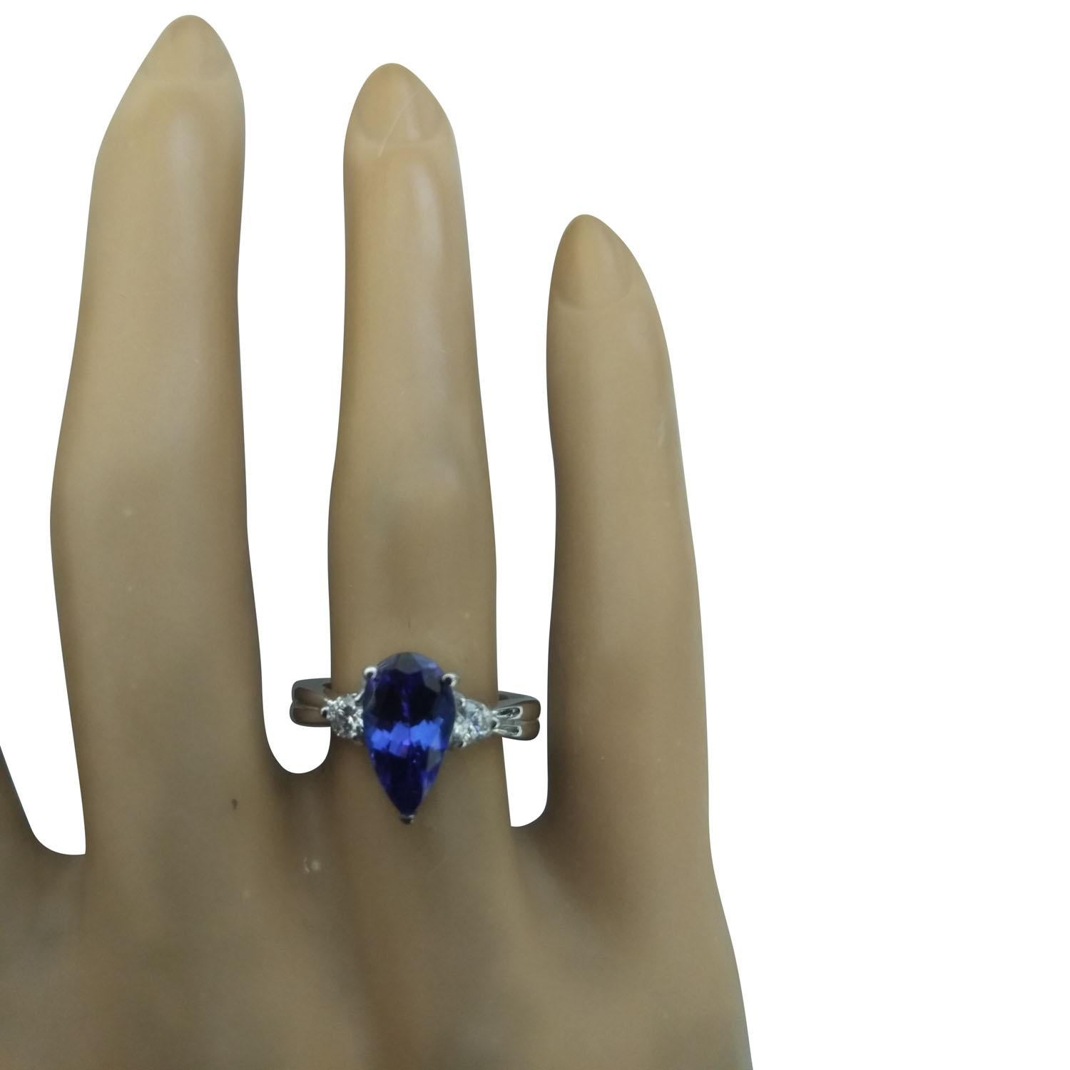 2.17 Carat Natural Tanzanite 14 Karat Solid White Gold Diamond Ring
Stamped: 14K 
Total Ring Weight: 3.1 Grams 
Tanzanite Weight 2.00 Carat (10.00x6.00 Millimeters)
Diamond Weight: 0.17 carat (F-G Color, VS2-SI1 Clarity )
Face Measures: 10.70x12.10
