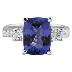 Bague en or blanc 14 carats avec tanzanite naturelle et diamants 