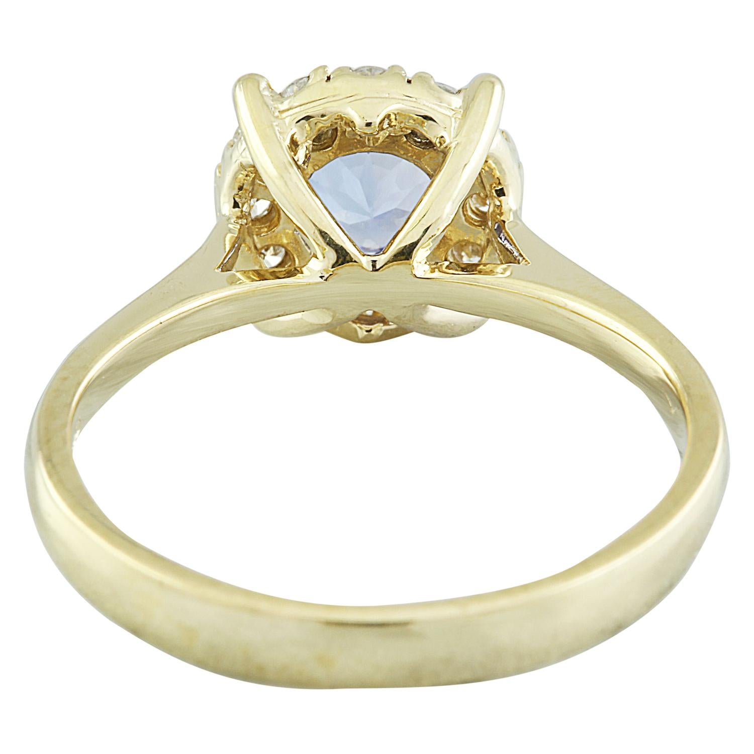 Women's Natural Tanzanite Diamond Ring In 14 Karat Yellow Gold For Sale