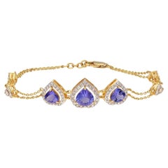 Natural Tanzanite & diamond bracelet in 14k gold