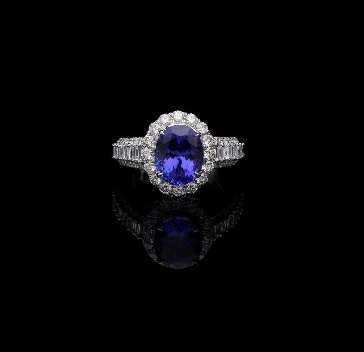 Edelstein : Tansanit

 Edelstein Gewicht : 3,4 Karat

 Edelstein Größe : 10X8 MM Ungefähr

 Edelsteinform : Ovaler Schliff

 Edelstein-Typ : Natürlich



DETAILS ZUM DIAMANTEN :

 Gewicht des Diamanten: 1,31 Karat.

 Diamantform : Rundschliff

