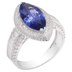 Natural tanzanite & diamond ring in 18k gold