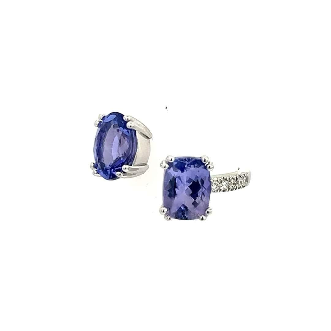 Natural 2 Tanzanite and Diamond Ring Size 6 14k W Gold 4 TCW

Certified $5,950 402664

This high-fashion ring showcases two stunning natural tanzanite stones, each beautifully faceted to enhance their captivating blue-violet hues.
One tanzanite is