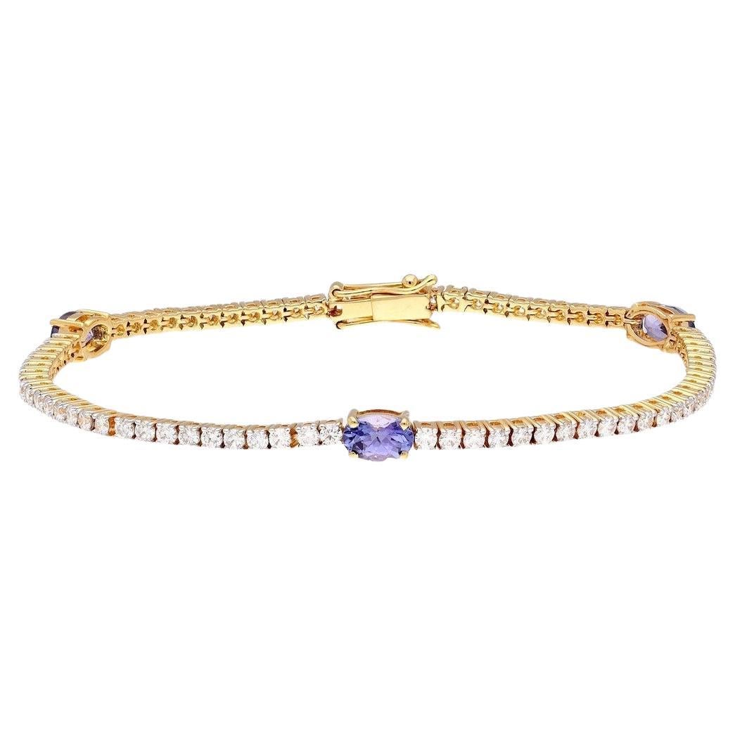Tennisarmband aus 18 Karat Gold mit natürlichem Tansanit und Diamanten