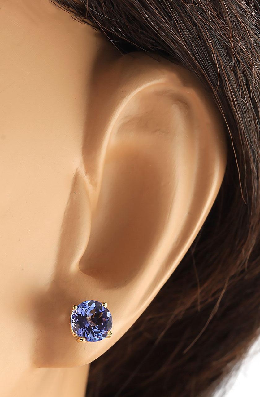 Modern Exquisite Natural Tanzanite Earrings In 14 Karat Yellow Gold  For Sale