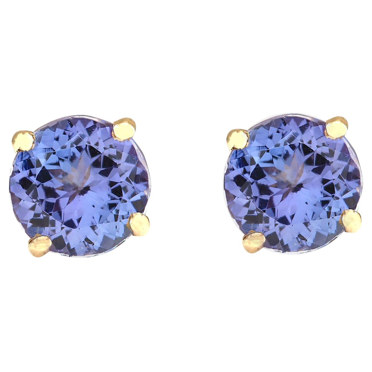 Exquisite Natural Tanzanite Earrings In 14 Karat Yellow Gold  For Sale