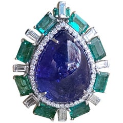 Natural Tanzanite, Emerald and Diamond Ring Set in 18 Karat Gold Natural Tanzanite, Emerald and Diamond Ring Set in 18 Karat Gold
