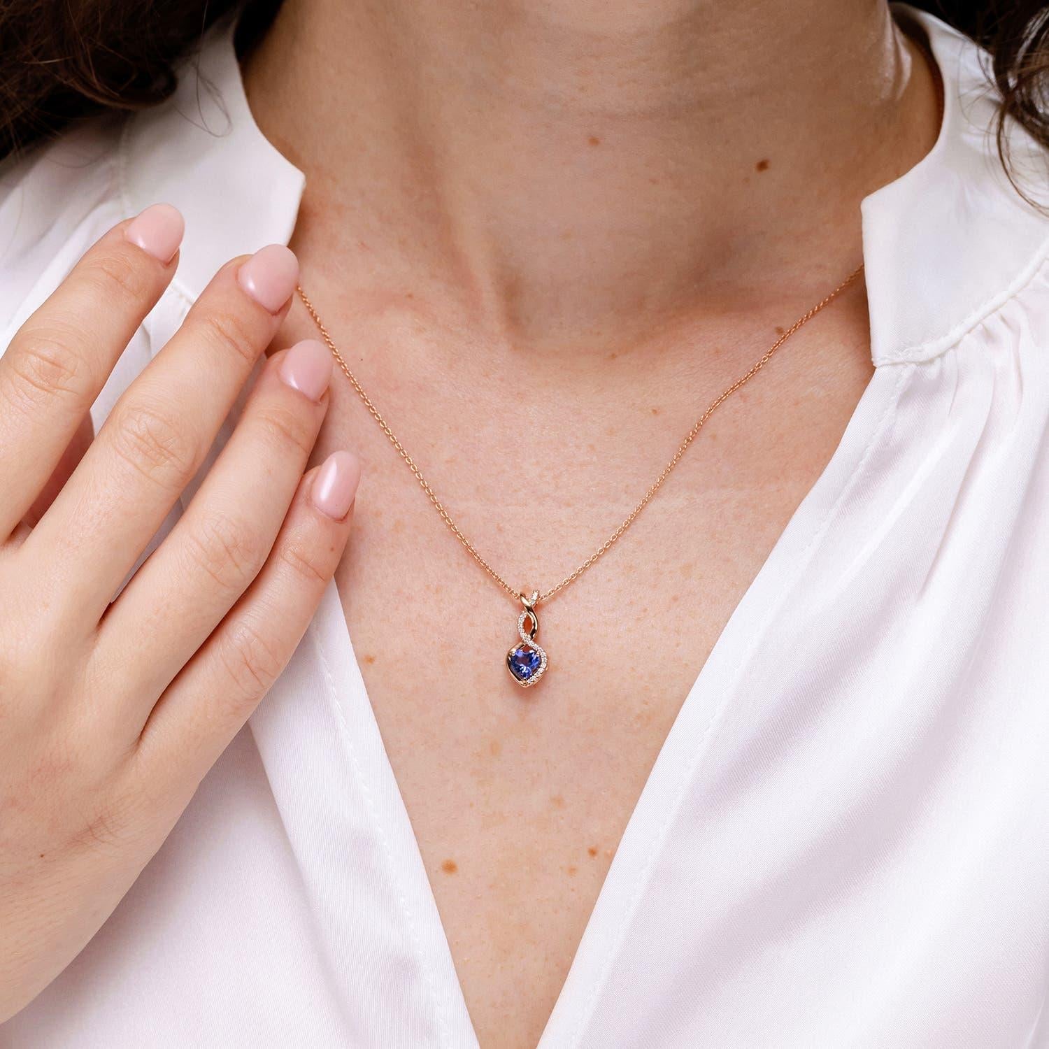 Modern Natural Tanzanite Infinity Heart Pendant with Diamonds in 14K Yellow Gold For Sale