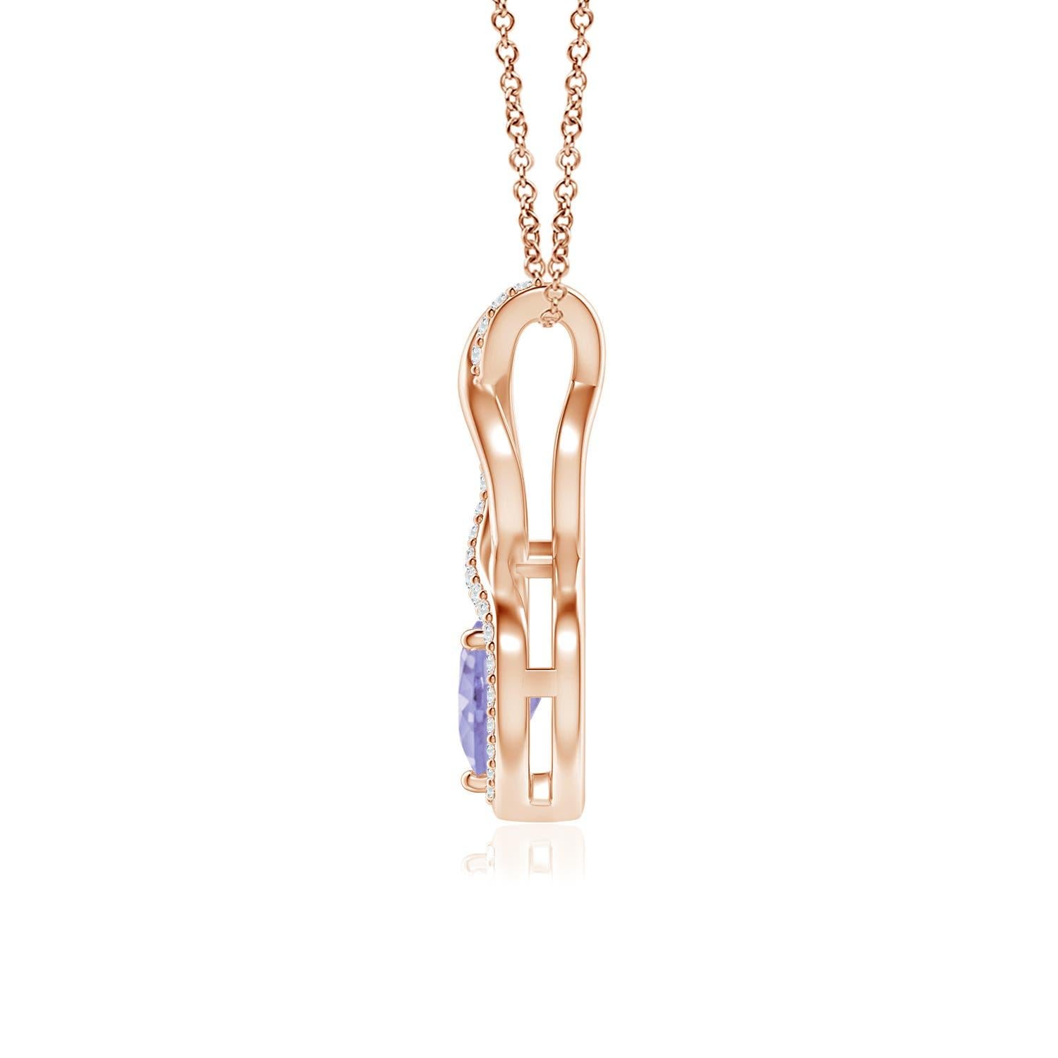 A diamond studded strip entwines with a lustrous metal strip to form an ornate infinity. Floating amid the graceful infinity is a heart-shaped bluish-violet tanzanite in a prong setting. The sparkling diamonds infuse a captivating edge to this 18k