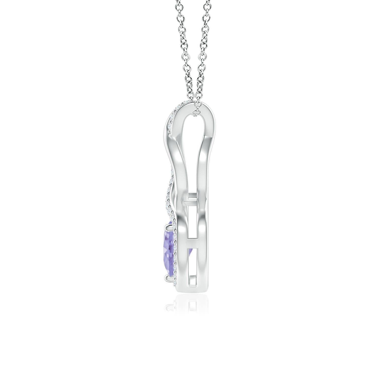A diamond studded strip entwines with a lustrous metal strip to form an ornate infinity. Floating amid the graceful infinity is a heart-shaped bluish-violet tanzanite in a prong setting. The sparkling diamonds infuse a captivating edge to this 18k