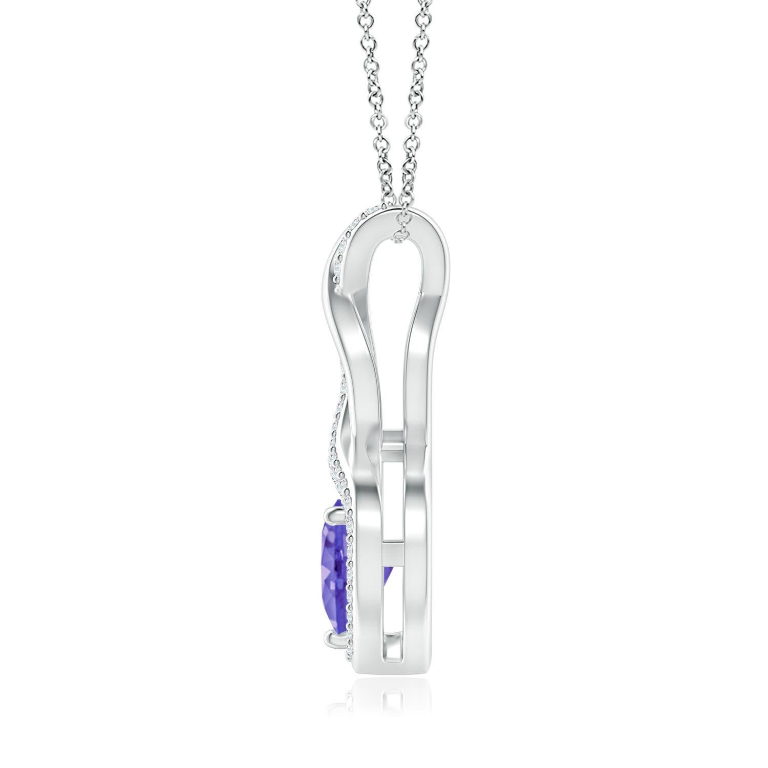 A diamond studded strip entwines with a lustrous metal strip to form an ornate infinity. Floating amid the graceful infinity is a heart-shaped bluish-violet tanzanite in a prong setting. The sparkling diamonds infuse a captivating edge to this