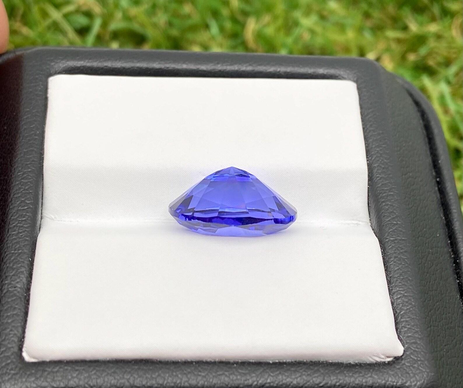 Gema suelta de tanzanita natural 5,49 ct, ovalada, certificado, ¡excelente talla! en venta 2