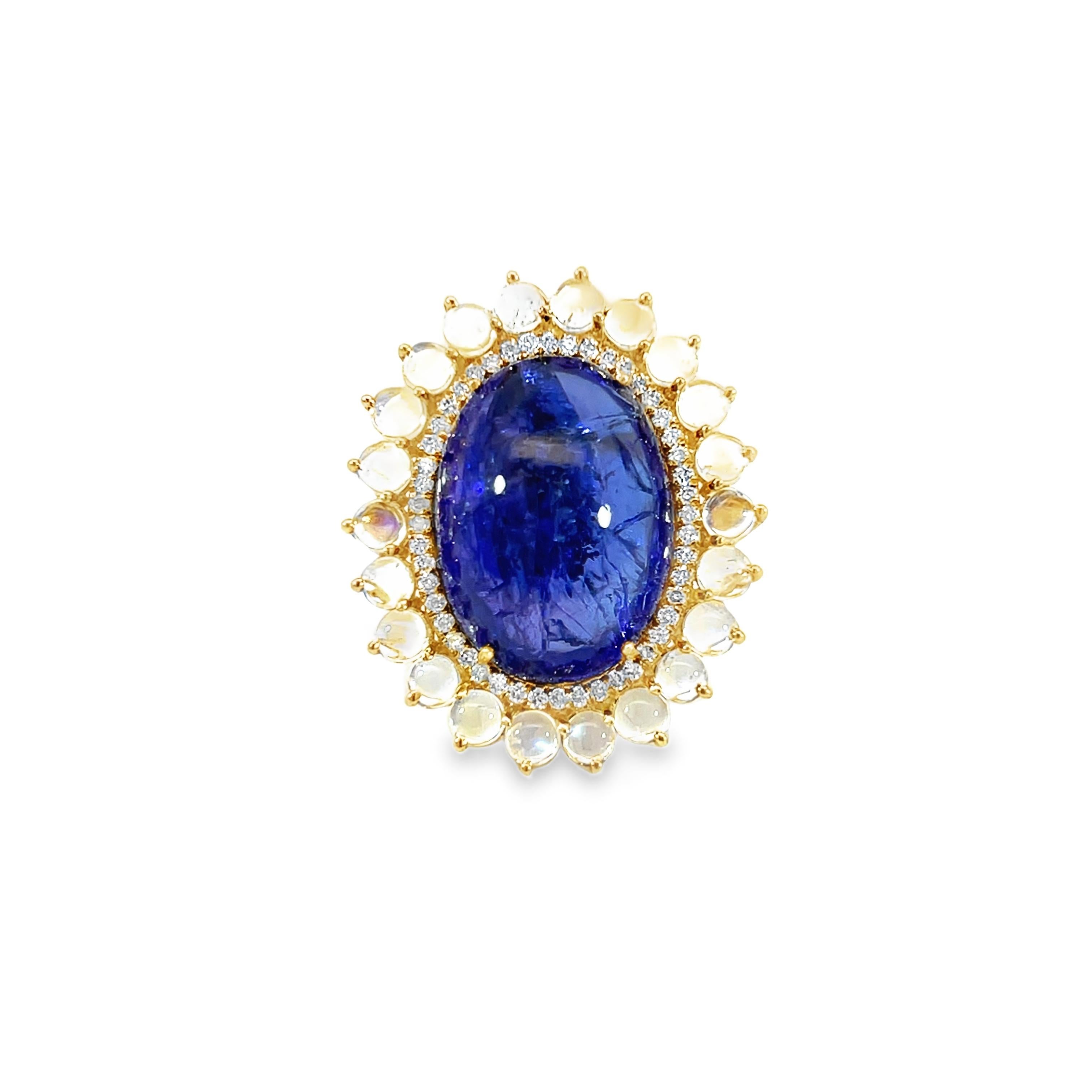 Découvrez le charme de cette magnifique bague en tanzanite de 17,12 carats, dont la pierre centrale ovale est entourée d'un halo de pierres blanches étincelantes en pierre de lune de 2,65 carats et d'un diamant de 0,40 carat.  Qu'il soit porté pour