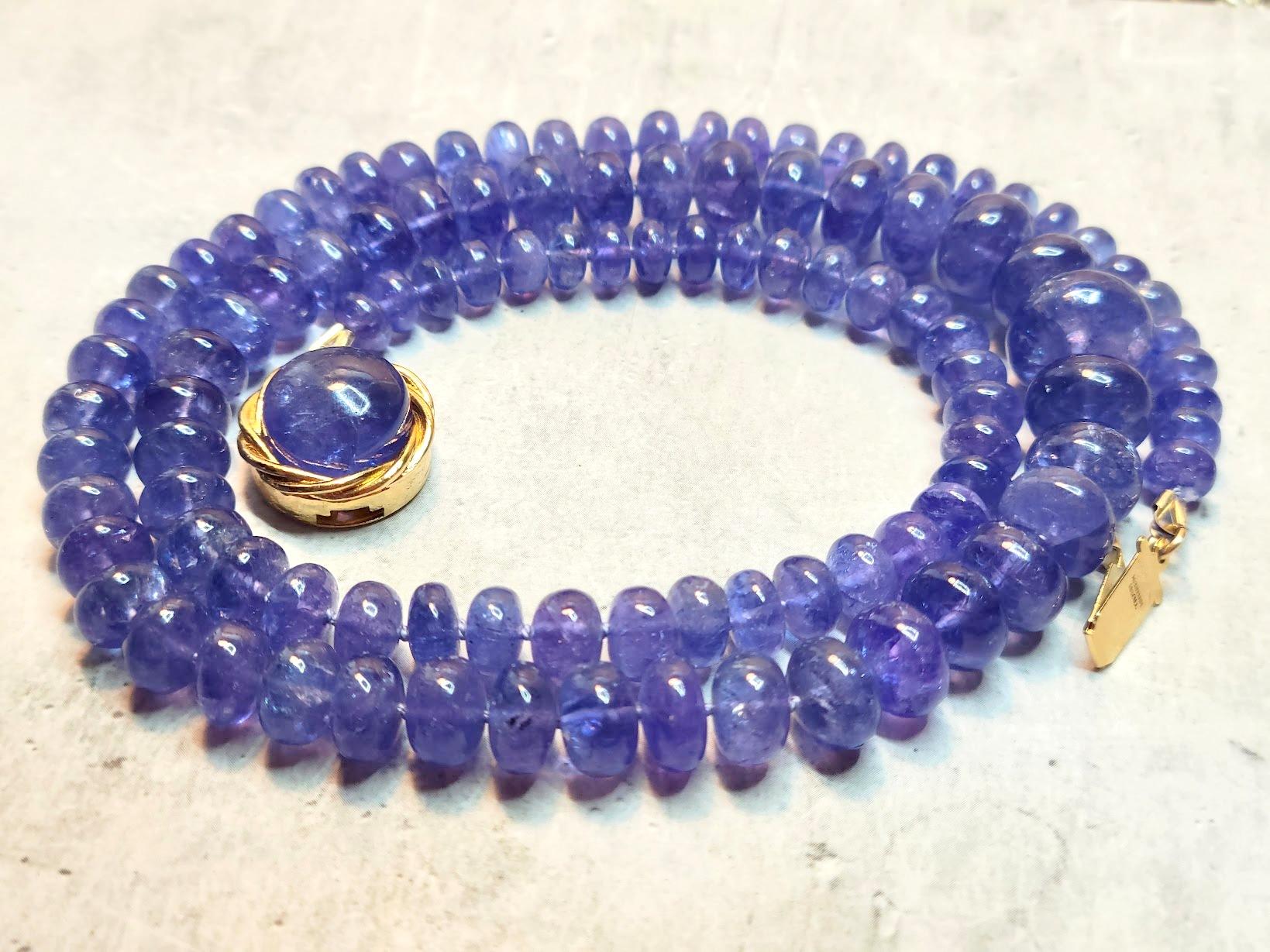 This stunning 22-inch necklace features exceptionally rare natural tanzanite beads ranging in size from 6mm to 12mm. Weighing 62 grams, the tanzanite shimmers in deep lilac, blue, and purple hues, making this piece truly unique. Thanks to its